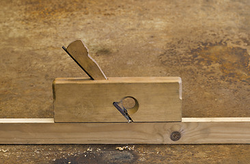 Image showing planer on wooden plank