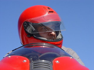 Image showing Man on a red bike