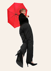 Image showing Businesswoman with an umbrella