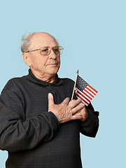 Image showing Senior man with american flag isolated