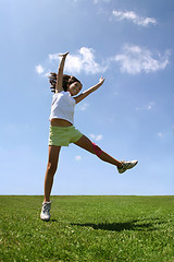 Image showing Happy girl on grass