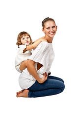 Image showing Mother and daughter sitting in the studio