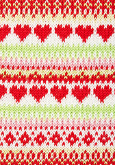 Image showing knitted background with a pattern in the shape of heart