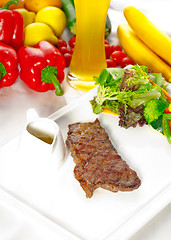 Image showing juicy BBQ grilled rib eye ,ribeye steak and vegetables