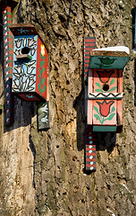 Image showing Painted nesting boxes.