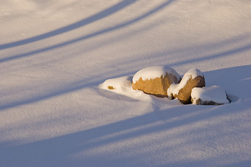 Image showing Stones covered with snow.