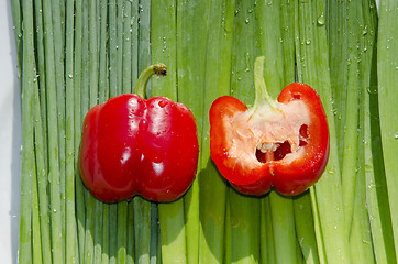 Image showing Two fat red paprikas. Orions. 