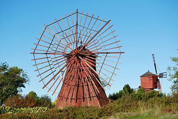 Image showing Beautiful Red Windmills