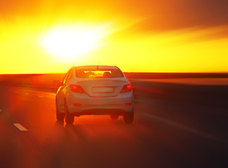 Image showing car at sunset on the highway