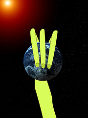 Image showing Alien Arm Grabbing The World 