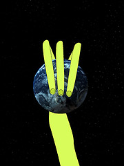 Image showing Alien Arm Grabbing The World 