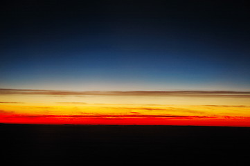 Image showing sunset above clouds