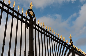 Image showing steel fence with gold spears