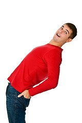 Image showing flexible man in red clothes and jeans