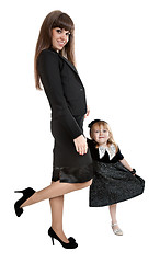 Image showing Mother with little girl standing on one leg