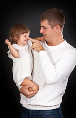 Image showing Dad plays with daughter