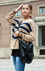 Image showing girl in beige sweater