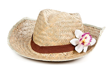 Image showing straw hat with a flower orchid