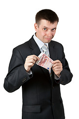 Image showing Businessman shows the two bills by ten euros