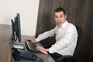 Image showing Male worker at a helpdesk