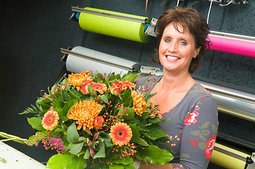 Image showing Florist working in a store