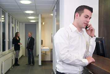 Image showing Young Businessman with Colleagues