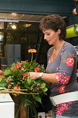 Image showing Florist working in a store