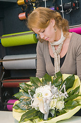 Image showing Florist working in a store