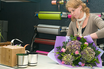 Image showing Florist working in a store