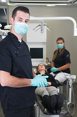 Image showing Dentist with nurse and patient