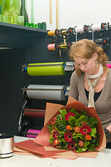 Image showing Florist working in a store