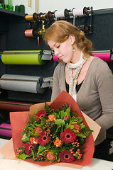 Image showing Florist working in a store