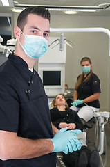 Image showing Dentist with nurse and patient