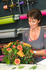 Image showing Florist working in a store