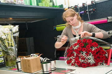 Image showing Florist working in a store