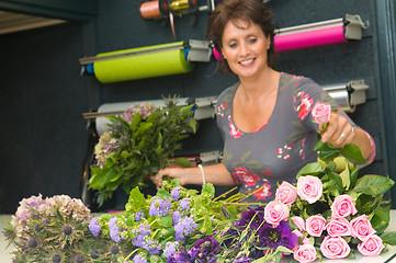 Image showing Florist working in a store