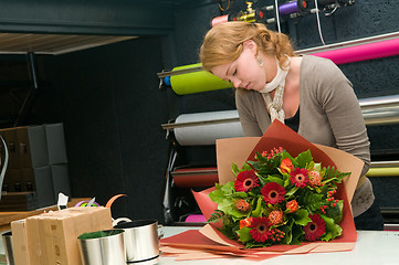 Image showing Florist working in a store