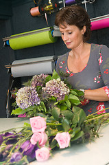 Image showing Florist working in a store