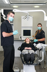 Image showing Dentist with nurse and patient