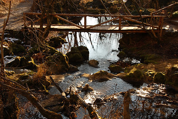 Image showing Stream and wooden bridge