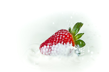 Image showing strawberry splashing into milk