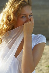 Image showing Young woman with white scarf