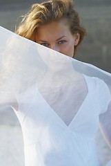 Image showing Young woman with white scarf