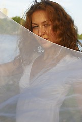 Image showing Young woman with white scarf