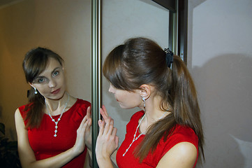 Image showing The girl in red dress 