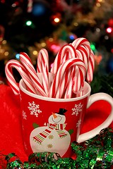 Image showing Christmas cup with candy canes 