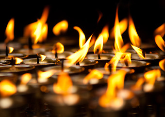 Image showing Close up of Candles at Buddhist temple