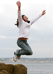 Image showing Jumping happy girl