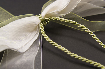 Image showing decorative white and green bow