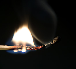 Image showing burning match